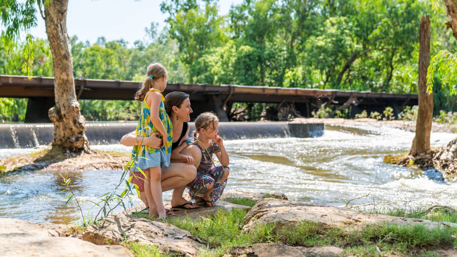 Rural generalist by a river with family